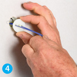 Step 4 on how to install GeeFix plasterboard fixings
